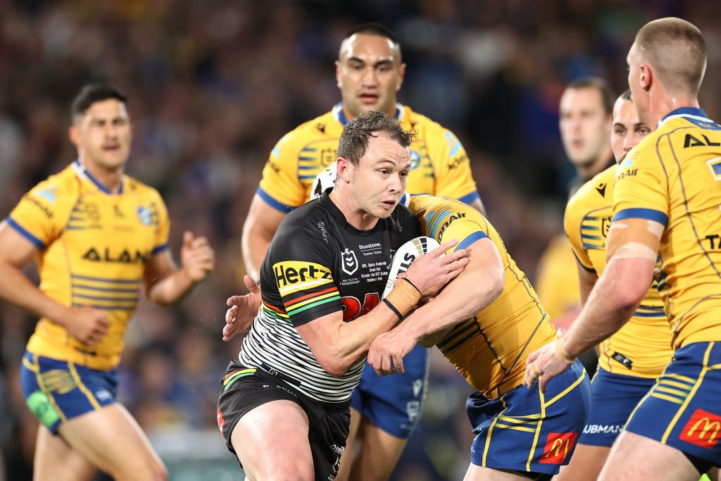 Penrith Panthers' Dylan Edwards runs into the Parramatta Eels defence in the NRL grand final.