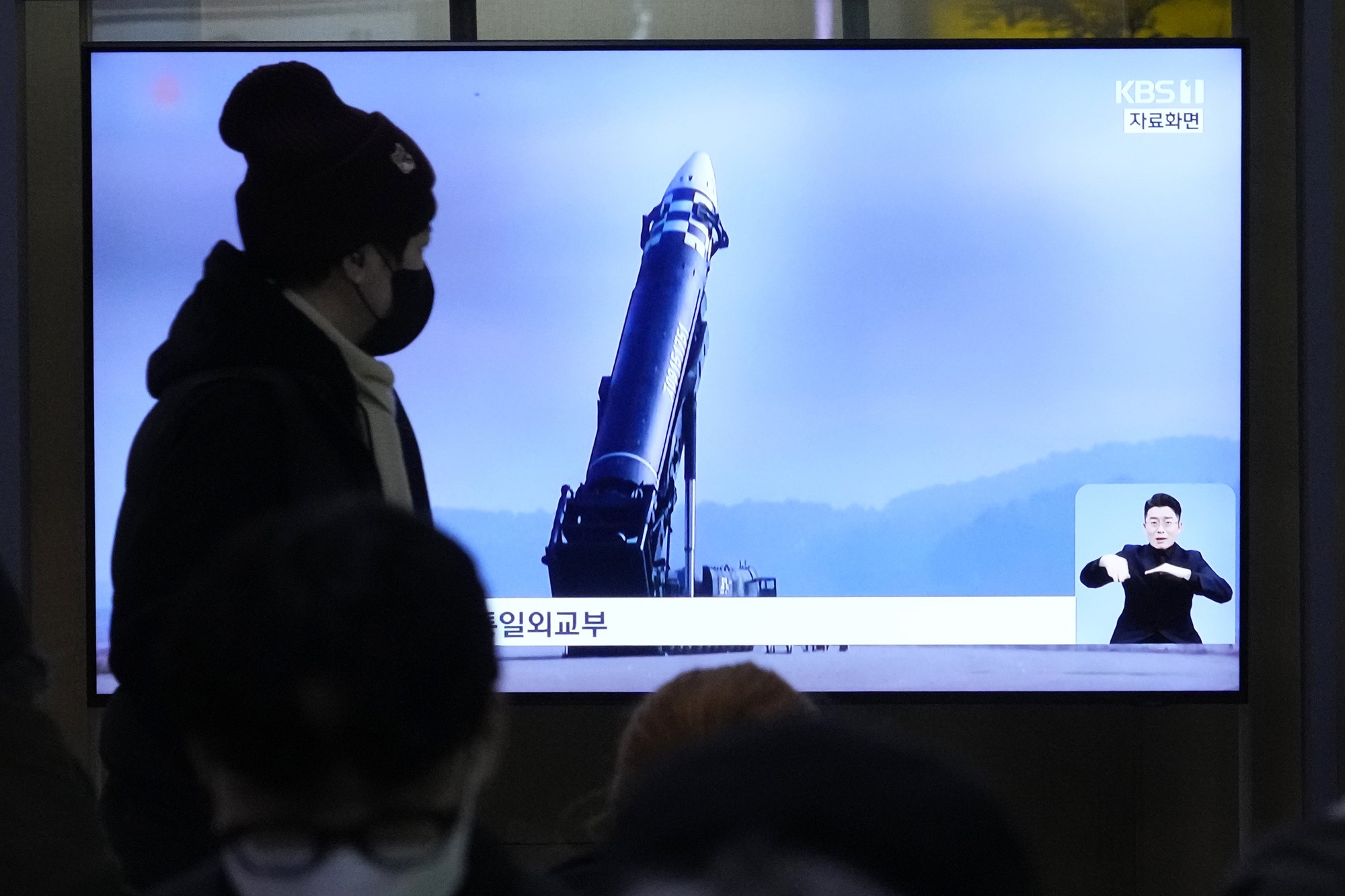 A TV screen shows a file image of North Korea's missile during a news program at the Seoul Railway Station in Seoul