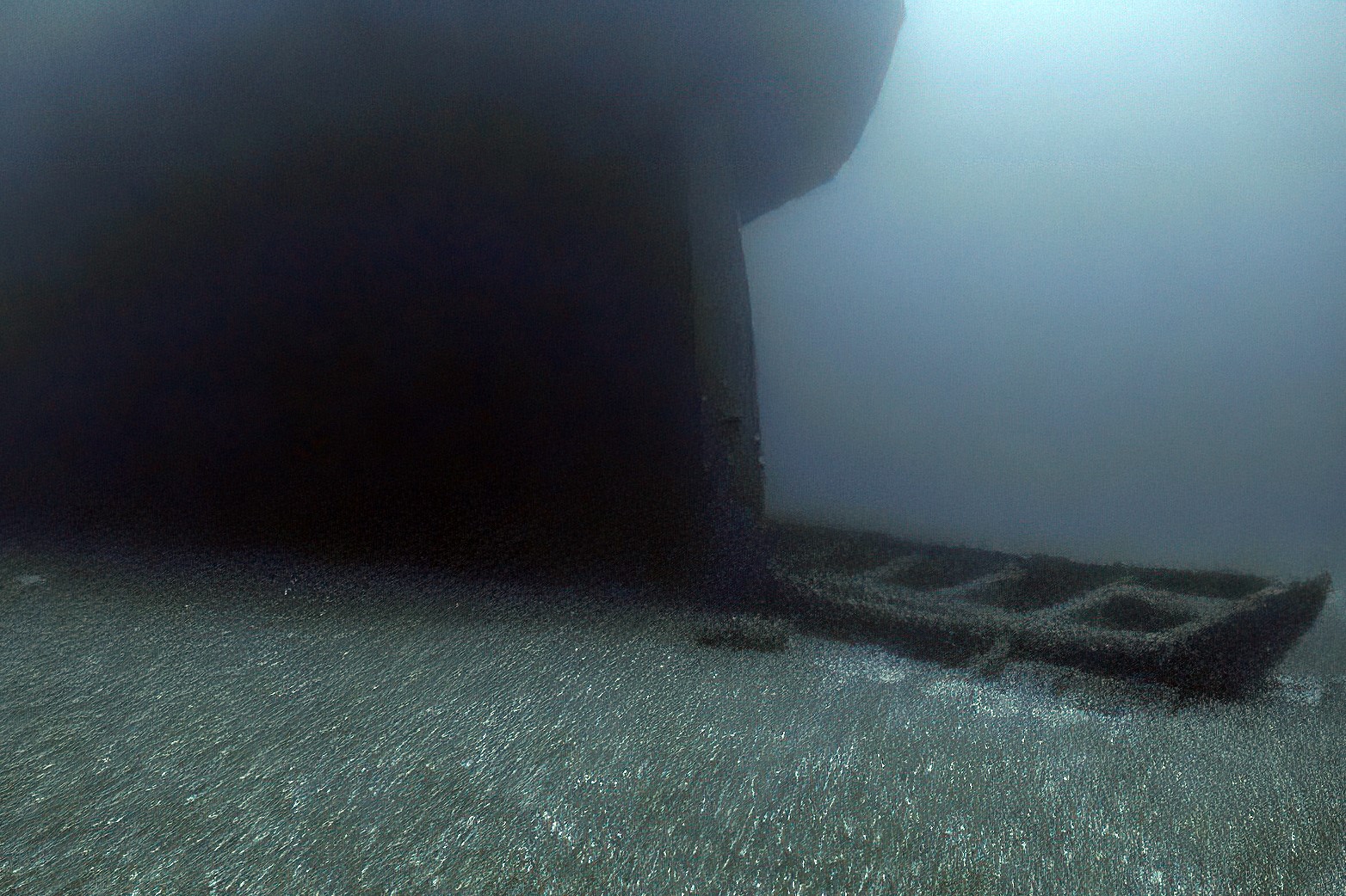 A screenshot of an underwater shipwreck video.