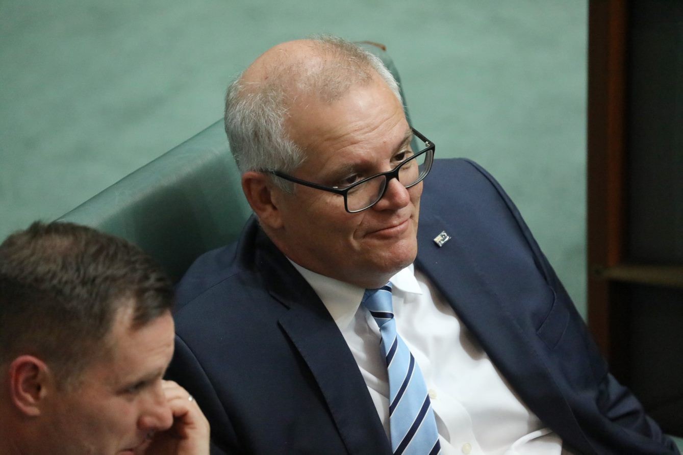 Scott Morrison smiling in parliament