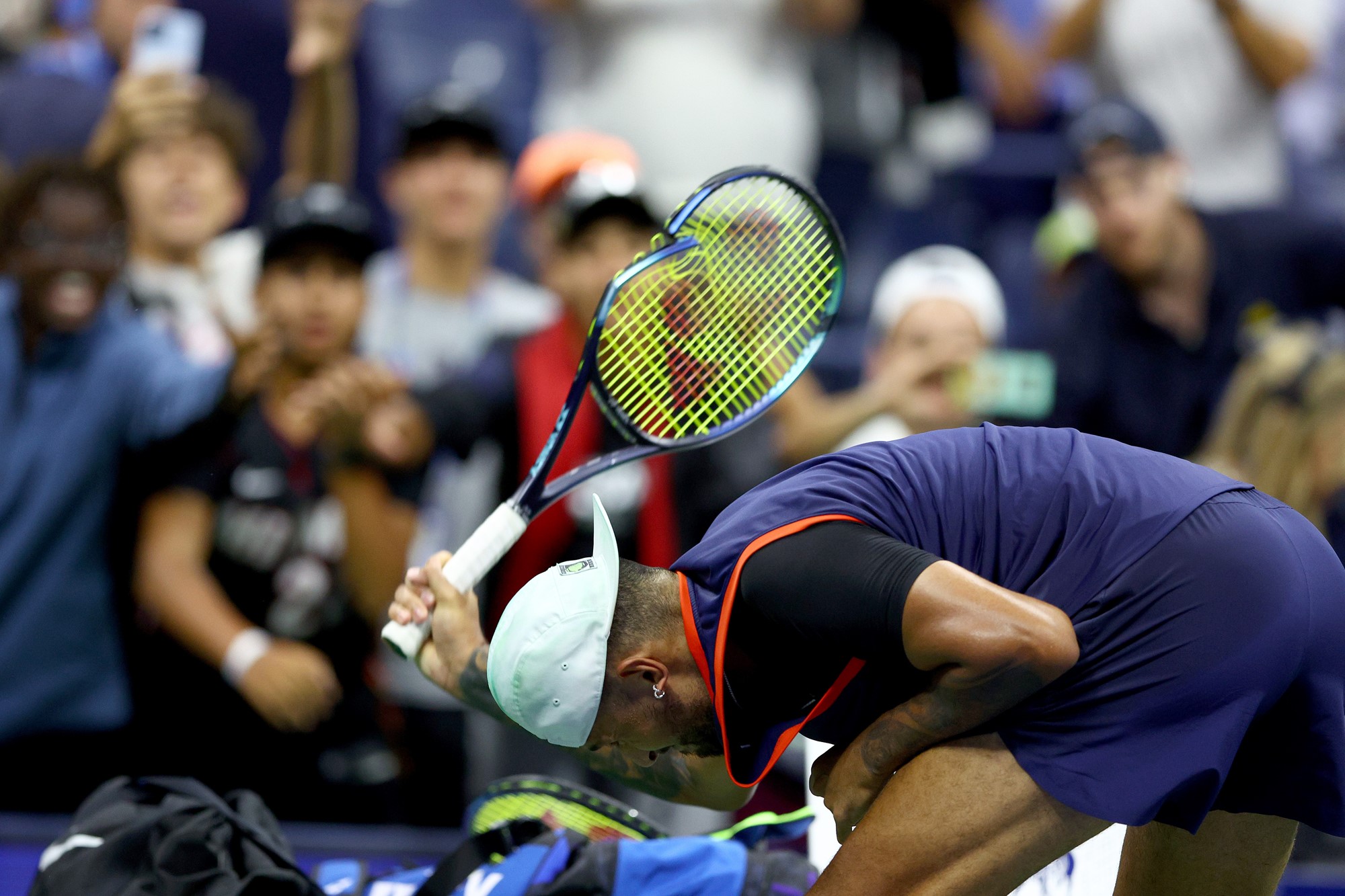 Nick Kyrgios smashes a racquet at the US Open