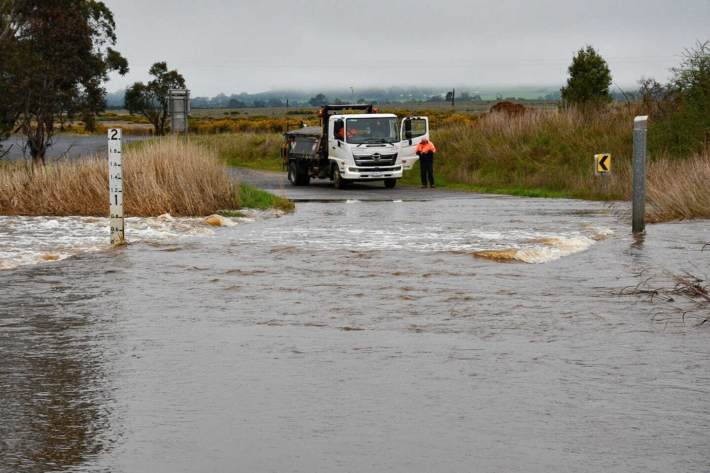 A truck is blocked by floodwater