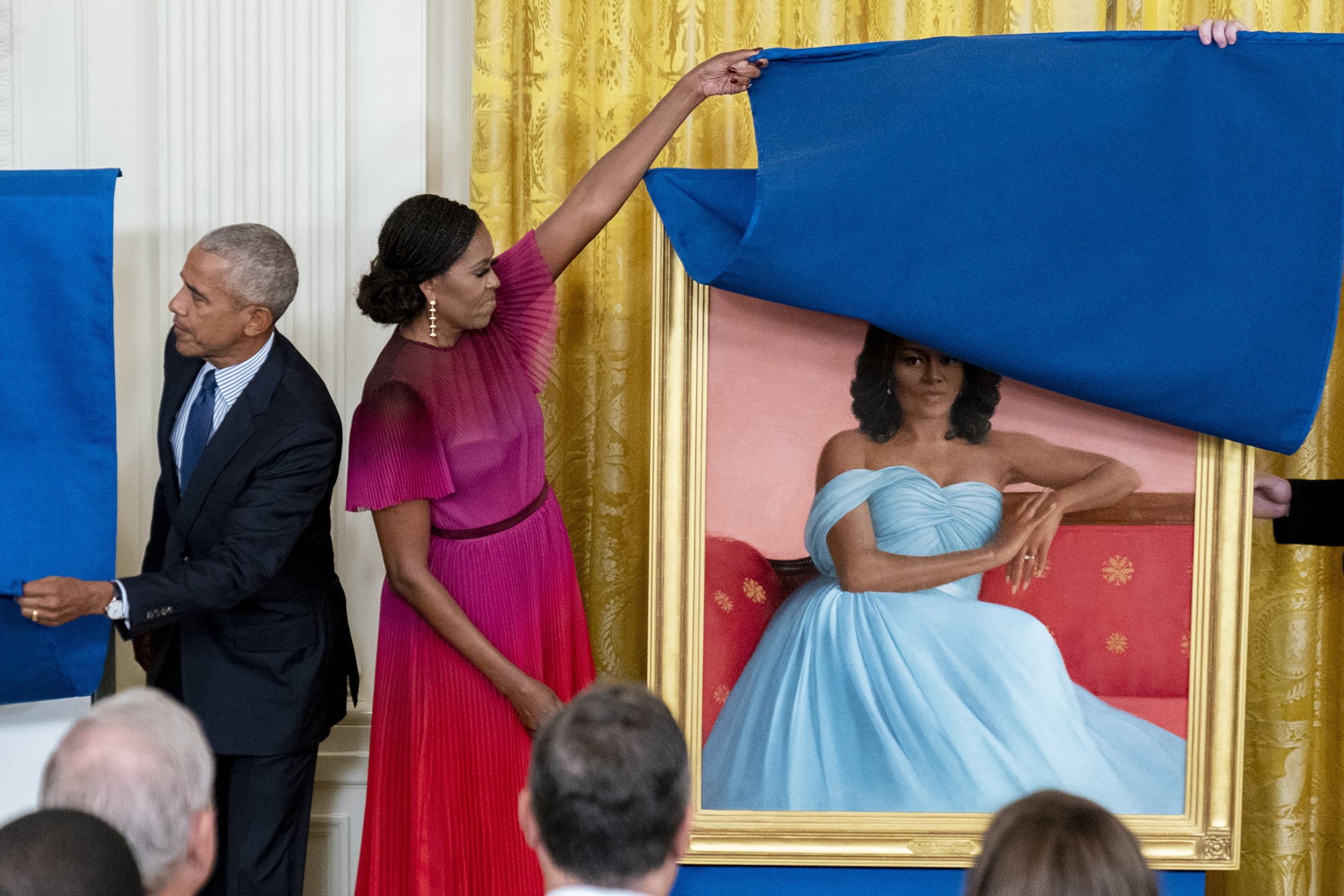 Former President Barack Obama and former first lady Michelle Obama unveil their official White House portraits during a ceremony in the East Room of the White House
