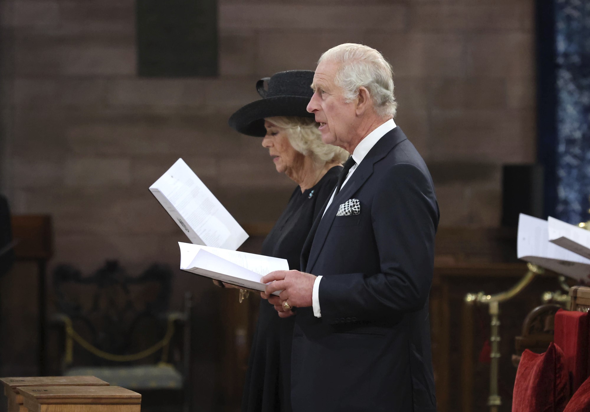 Britain's King Charles III and the Queen Consort attend a memorial service for Queen Elizabeth II 