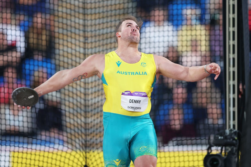 Matthew Denny of Australia launches a discus in the Commonwealth Games final.