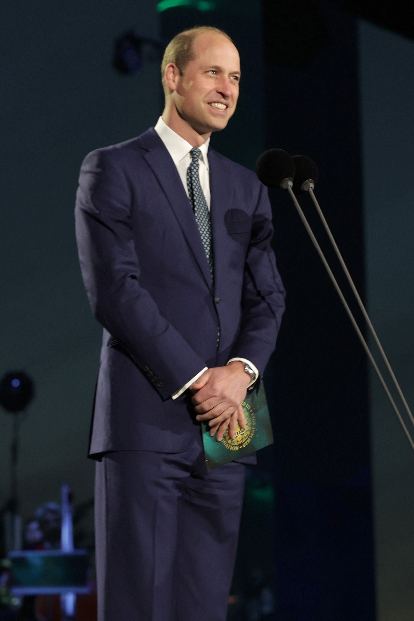 Prince William stands on stage