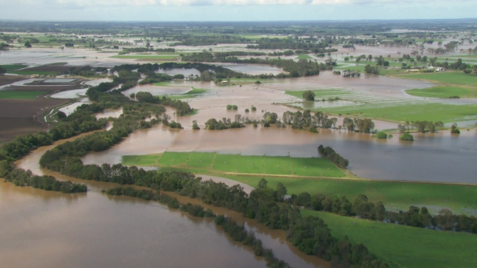 Aerial shot of flooded farms.