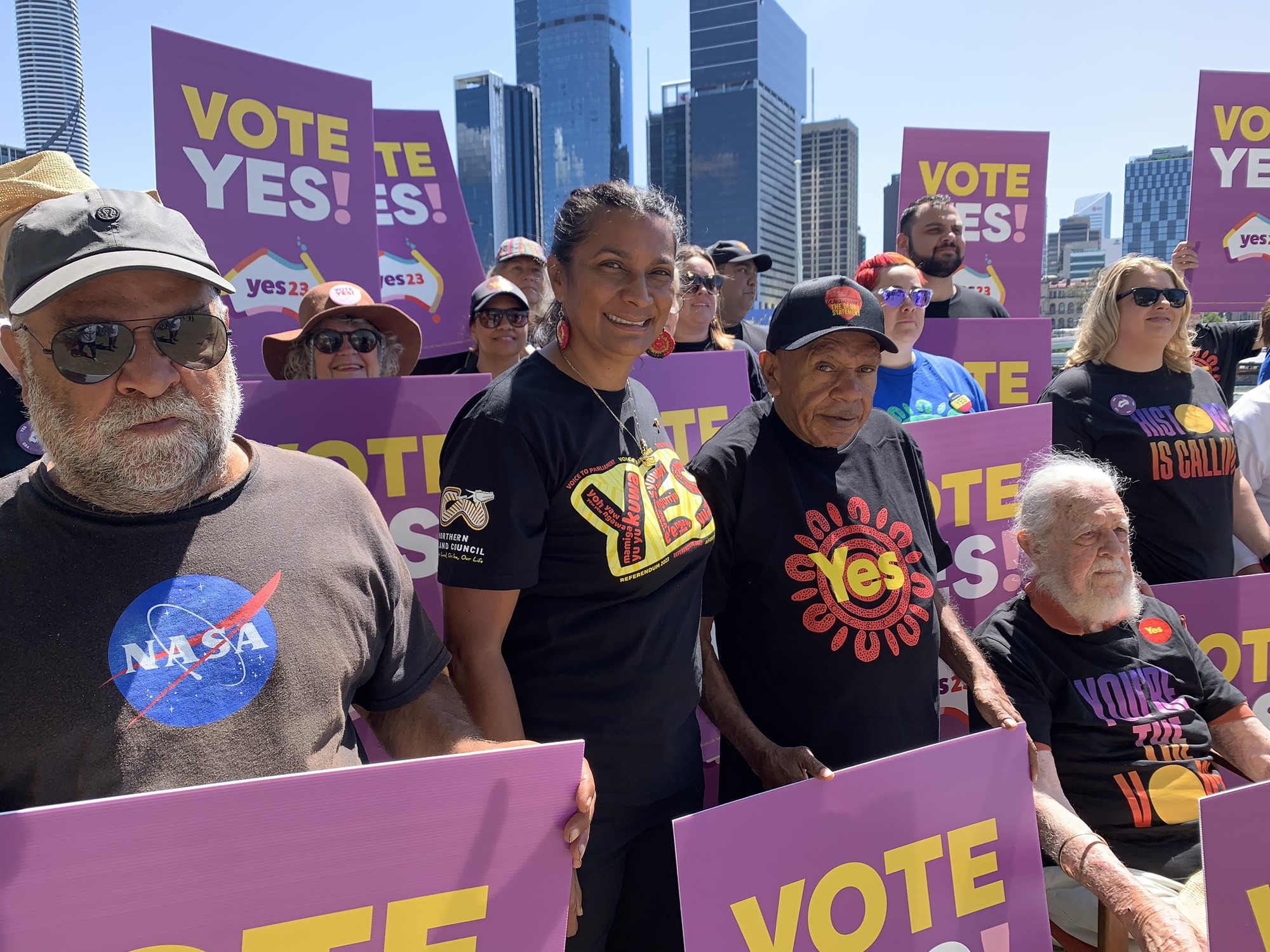 Nova Perris smiles for the camera at a Yes campaign in Brisbane.