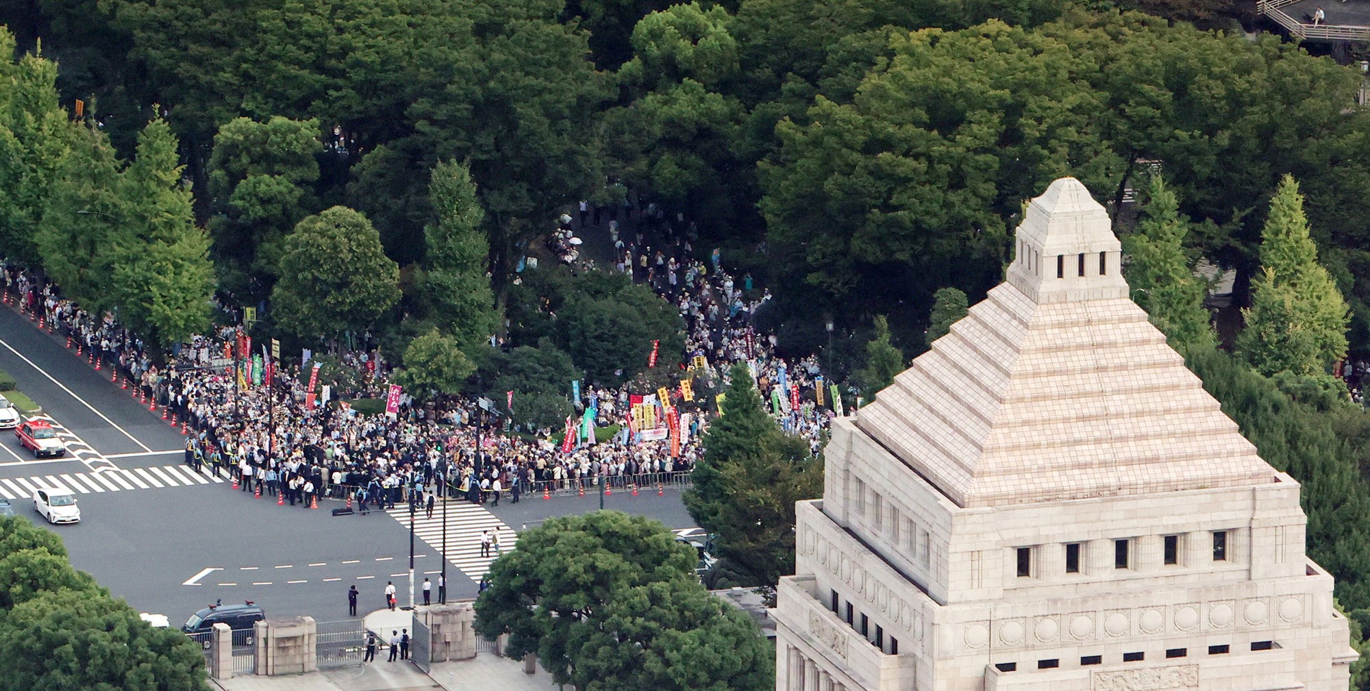 An aerial photo shows protesters of the state funeral of former Prime Minister Shinzo Abe