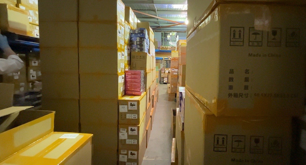 Multiple piles of cardboard boxes