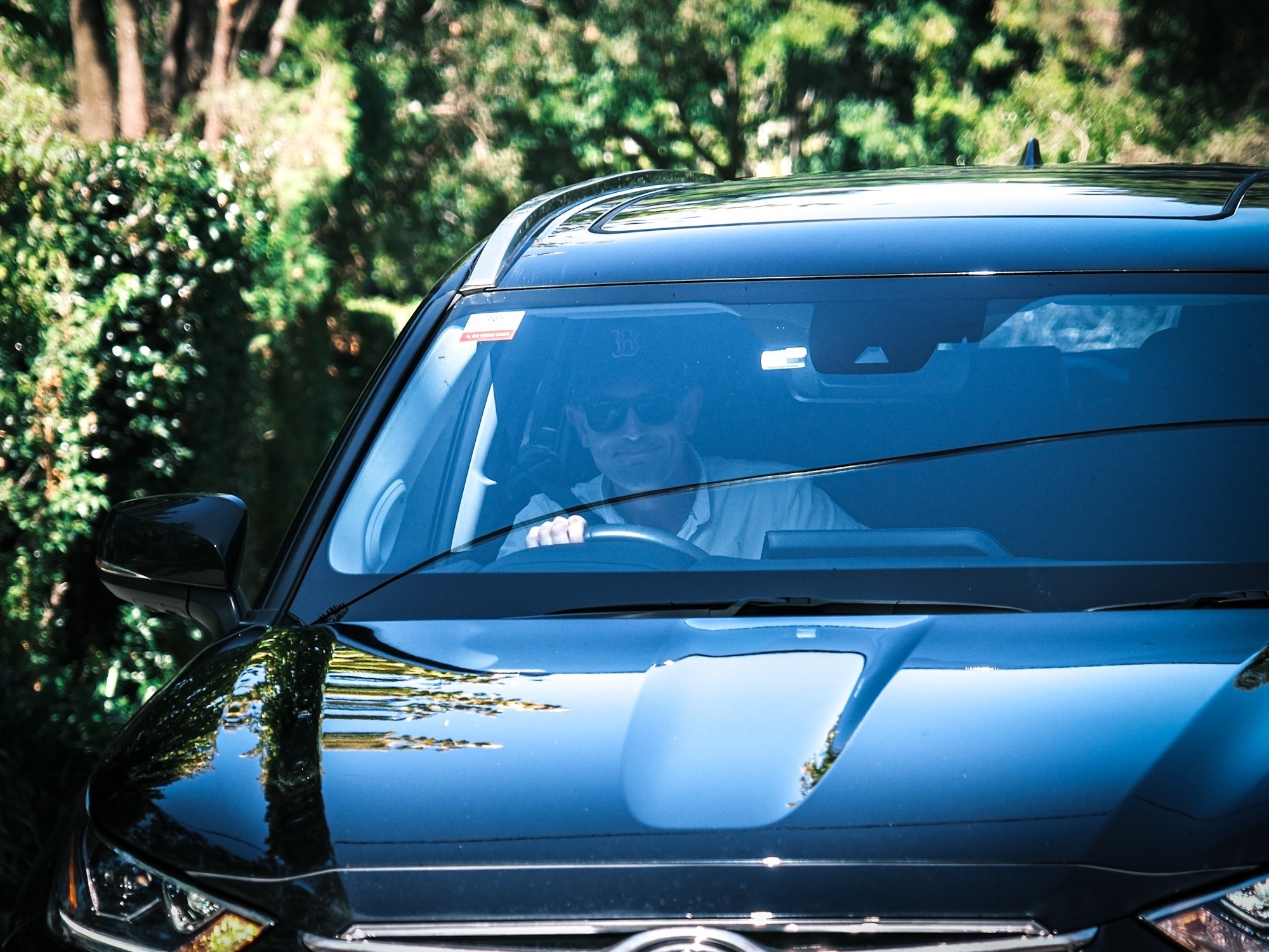 A man driving a car.