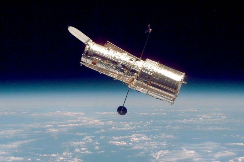 Hubble Space Telescope above earth.
