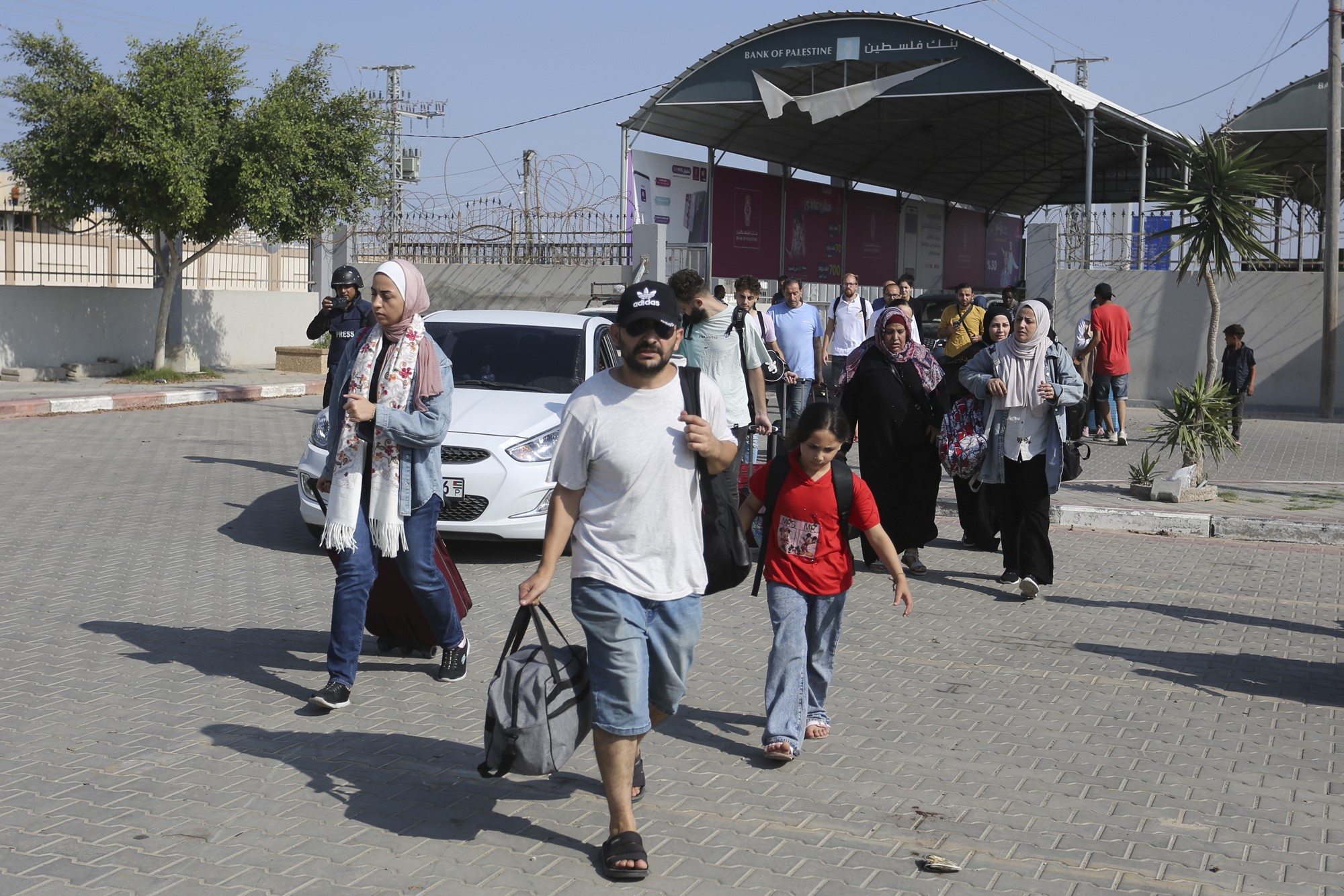 Man holding bag crosses into Egyptian side of Rafah border