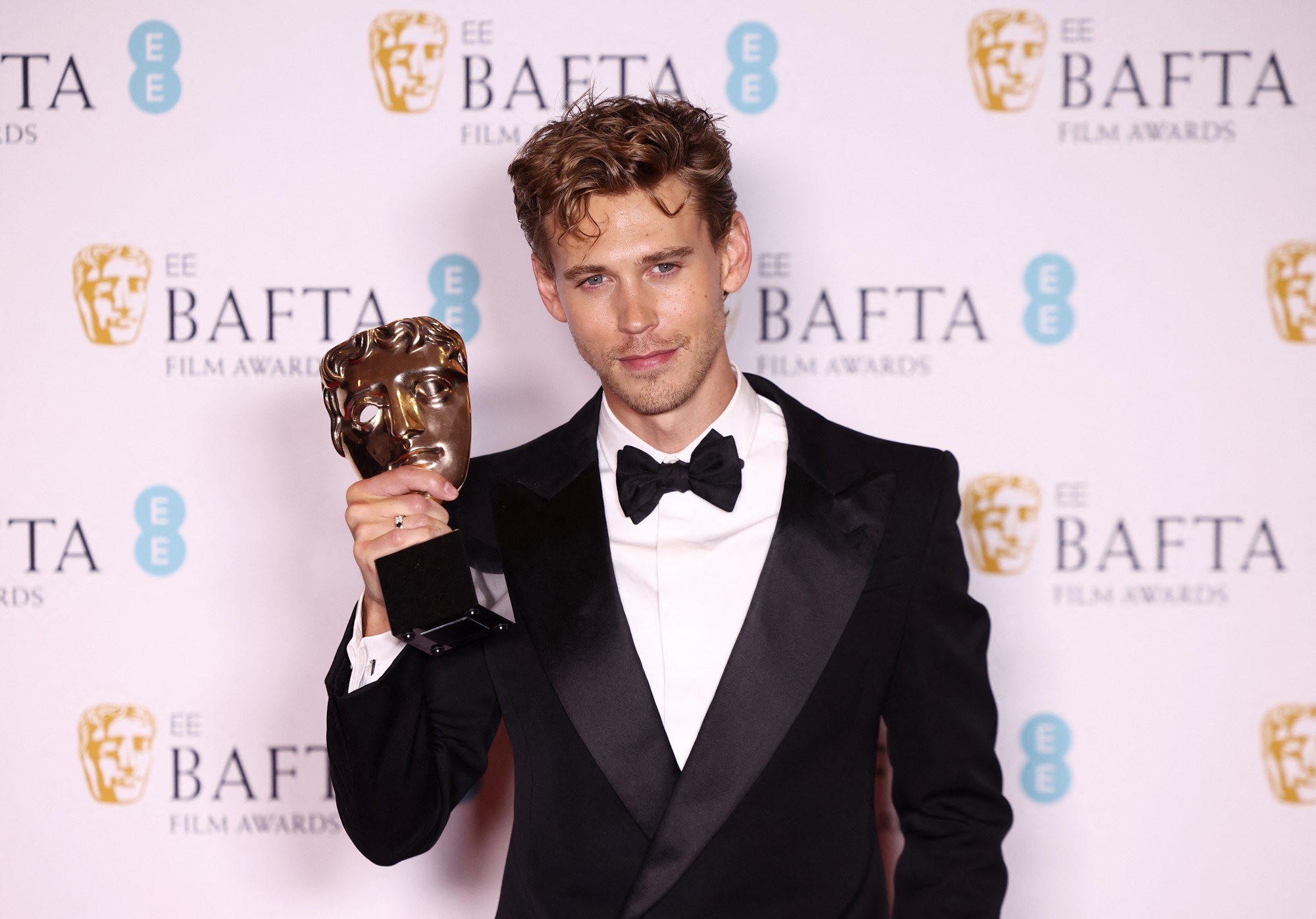 Austin Bulter poses with his BAFTA Award