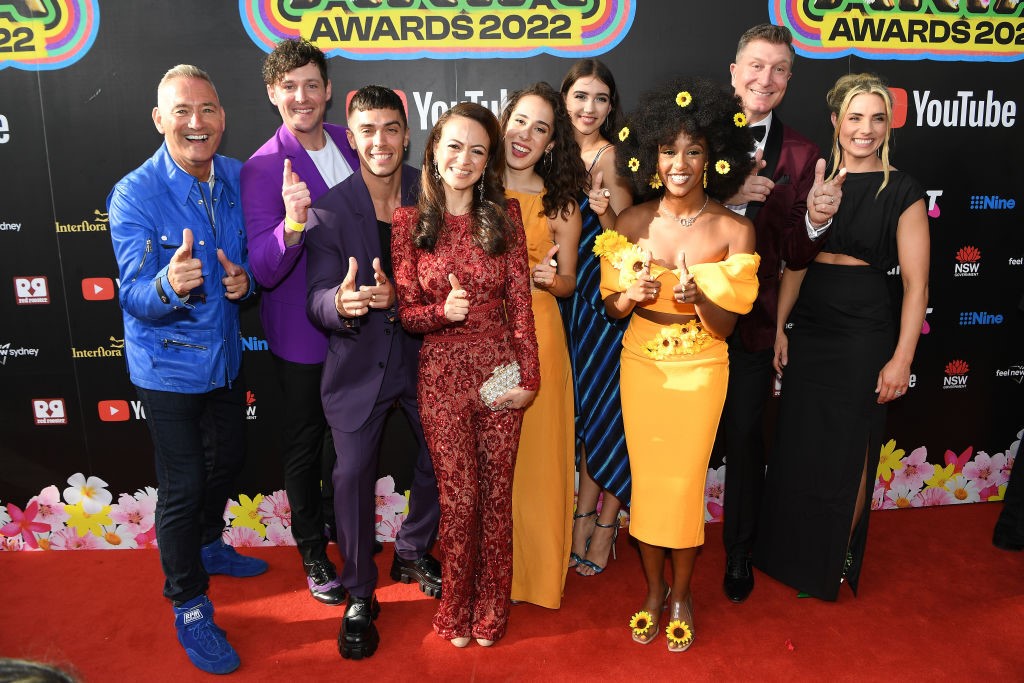 a group photo of the moves thrown on the red carpet of the arias