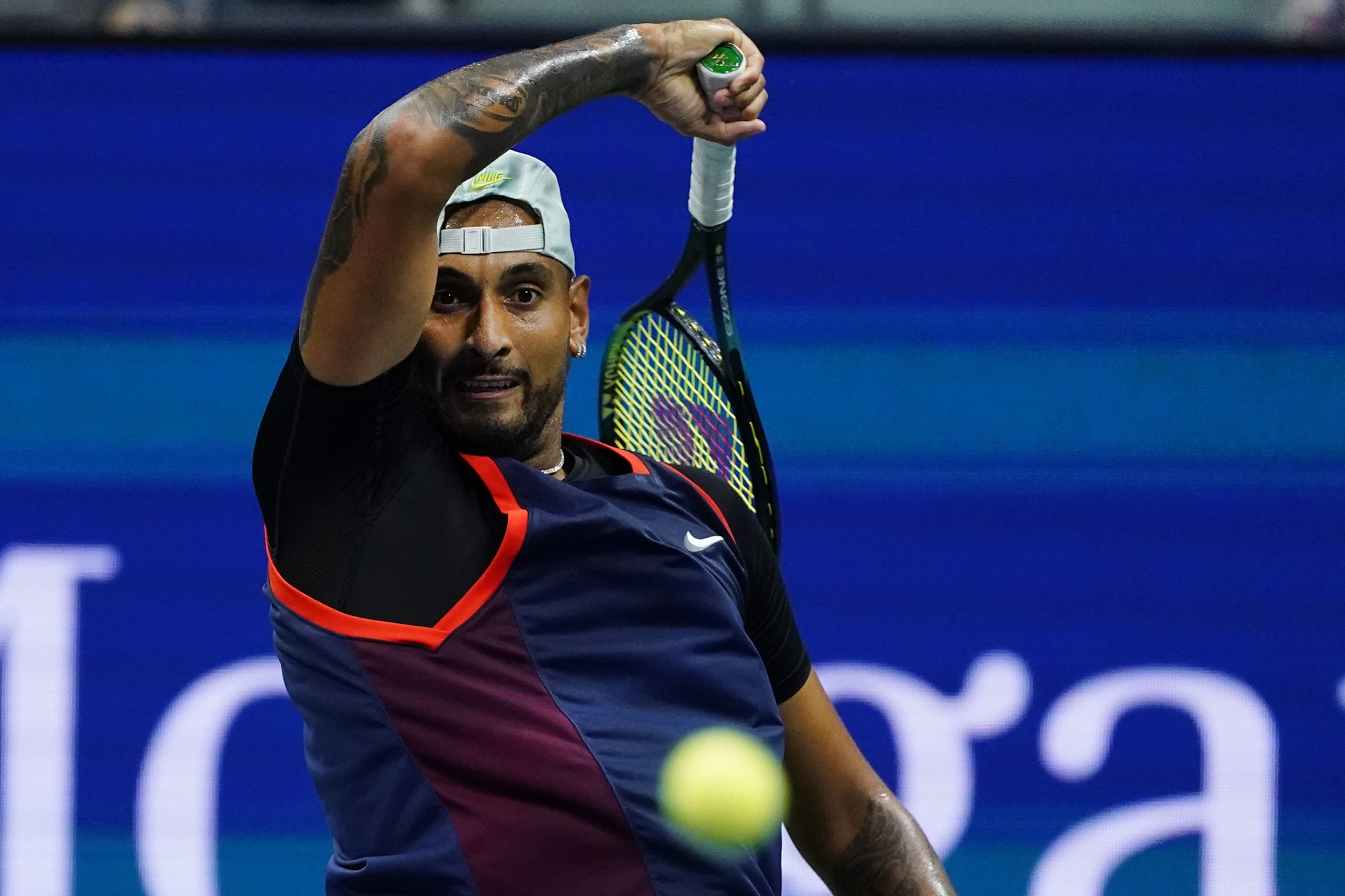 Nick Kyrgios plays a forehand at the US Open.