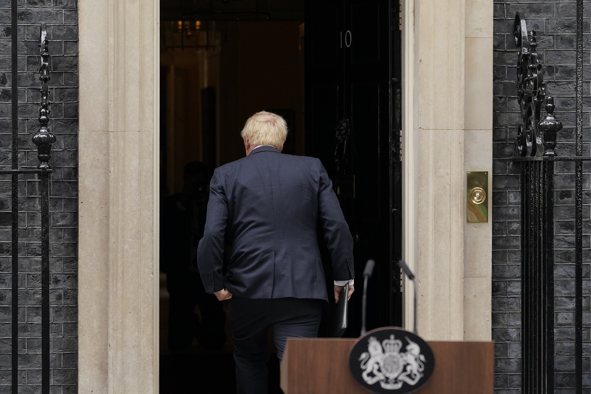 Boris walks back in Number 10.