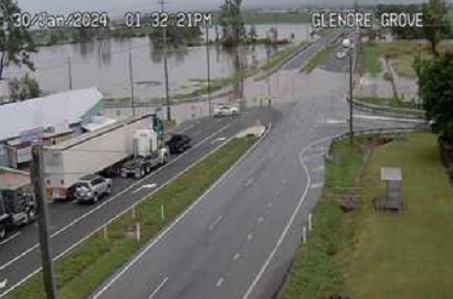 A traffic camera image of a flooded highway