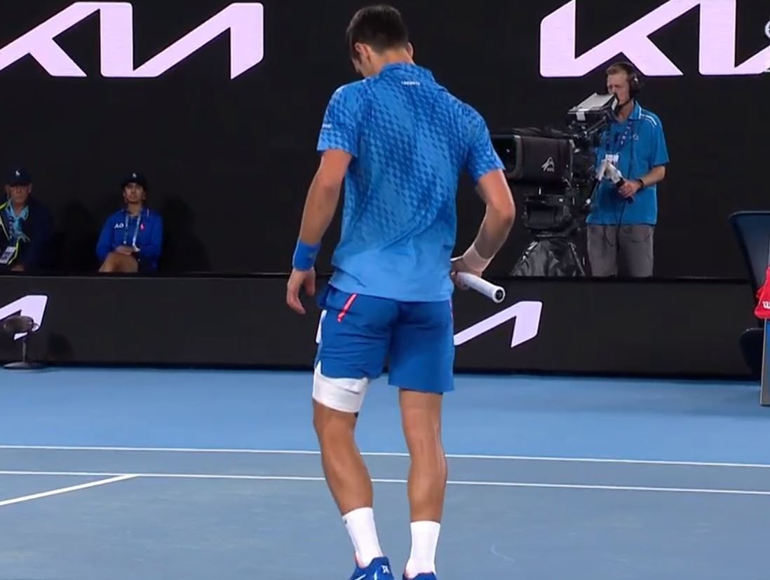 A view of Novak Djokovic from behind