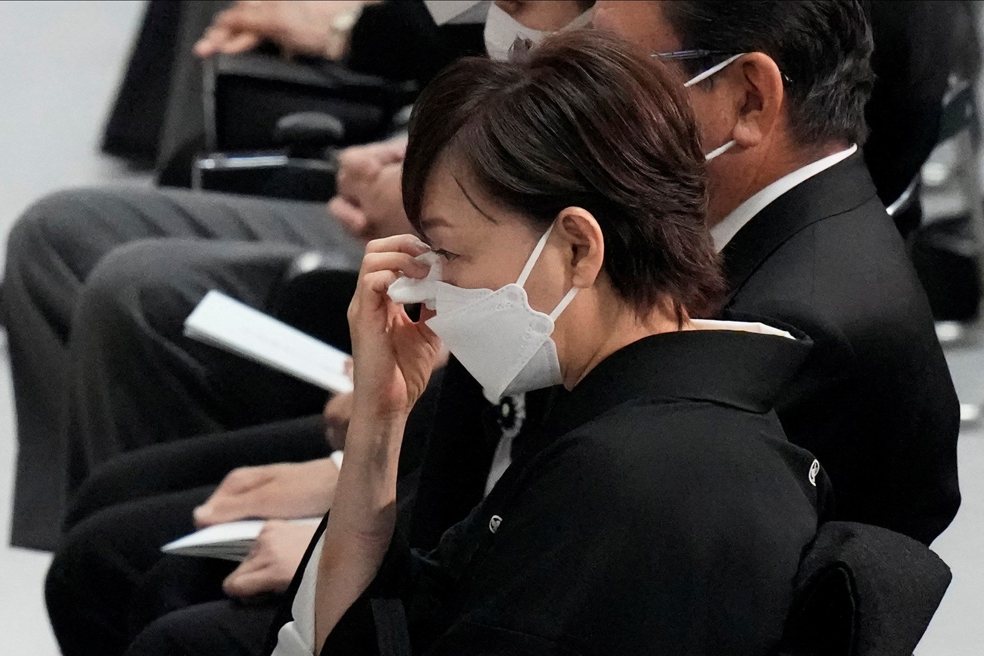 Akie Abe, widow of former Prime Minister of Japan Shinzo Abe, wipes away tears during the state funeral of her husband Tuesday Sept. 27, 2022, at Nippon Budokan i