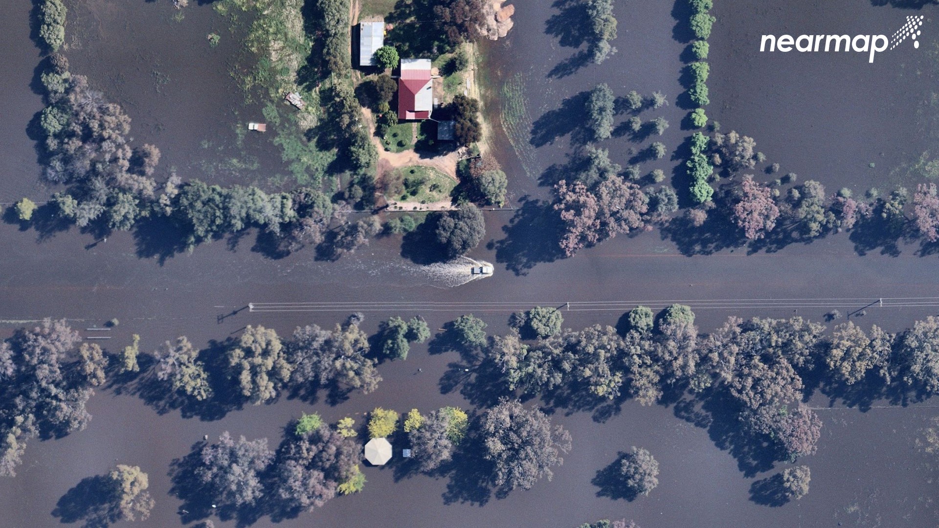 Flooding inundates Forbes as seen from the sky.
