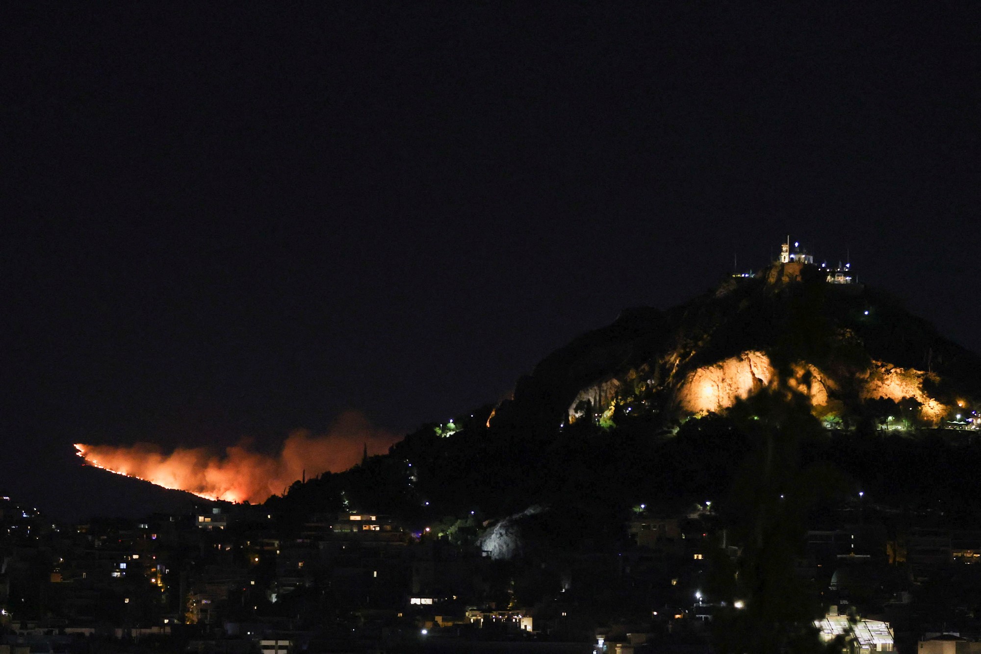 A fire burns near Athens.
