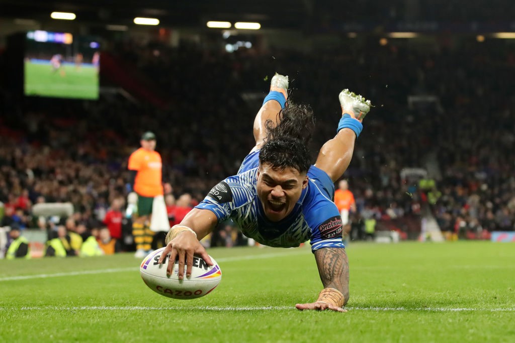 Brian To'o dives in for a try in the Rugby League World Cup final.