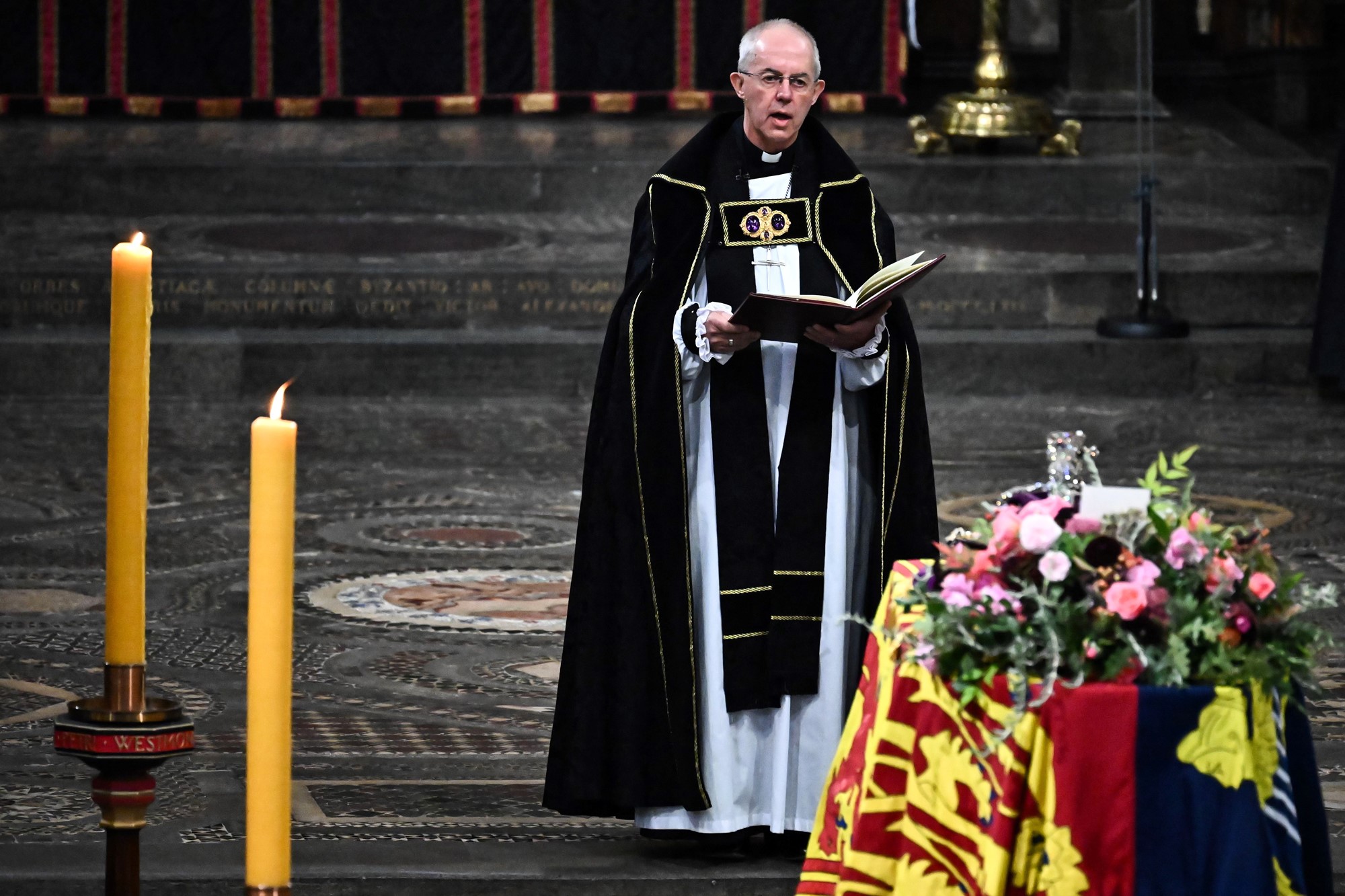 Justin Welby reads from a book