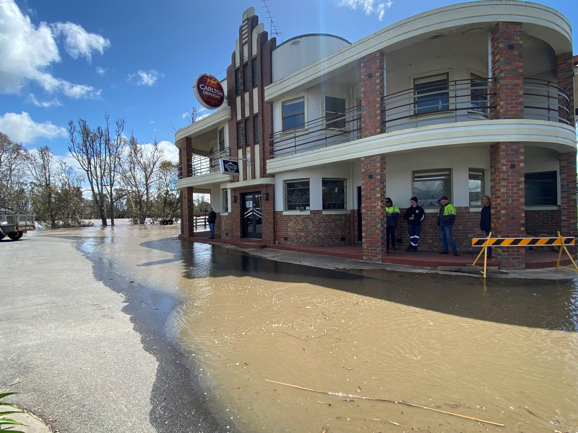 A hotel surrounded by floodwater.