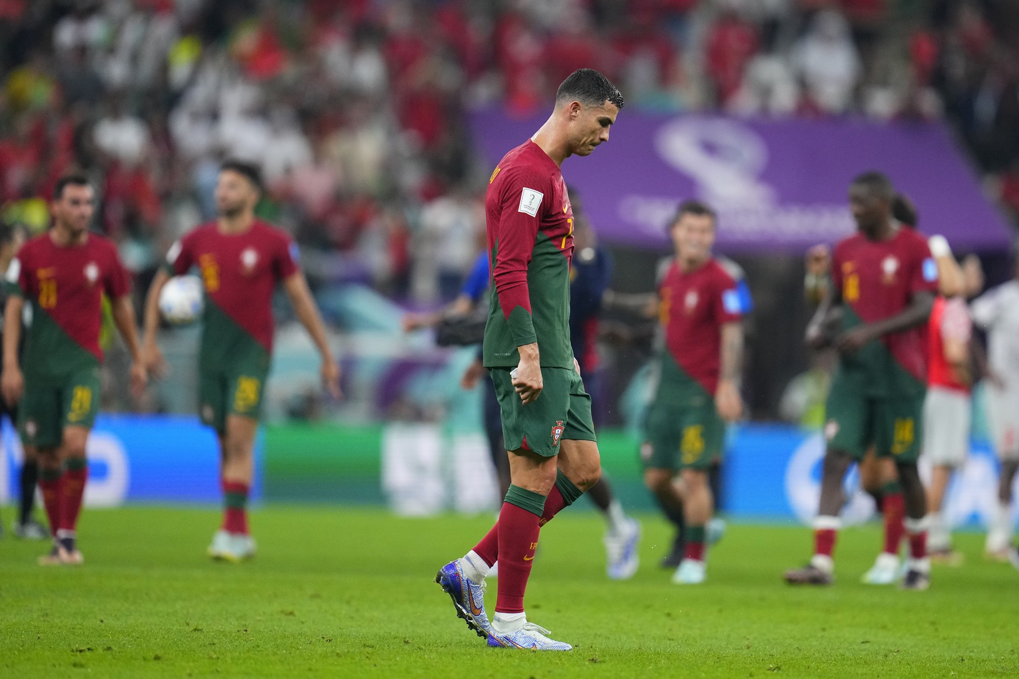 Cristiano Ronaldo hangs his head after Portugal's 6-1 Qatar World Cup win over Switzerland.