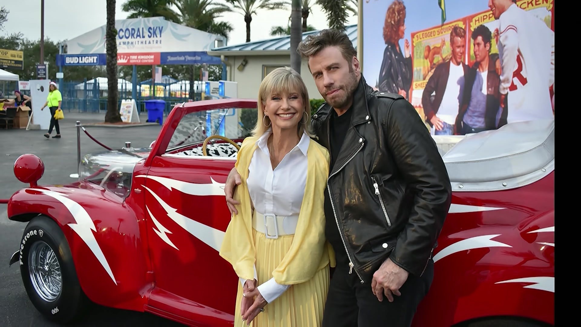 Olivia Newton-John and John Travolta pose for a Grease-themed photo shoot, later in life.