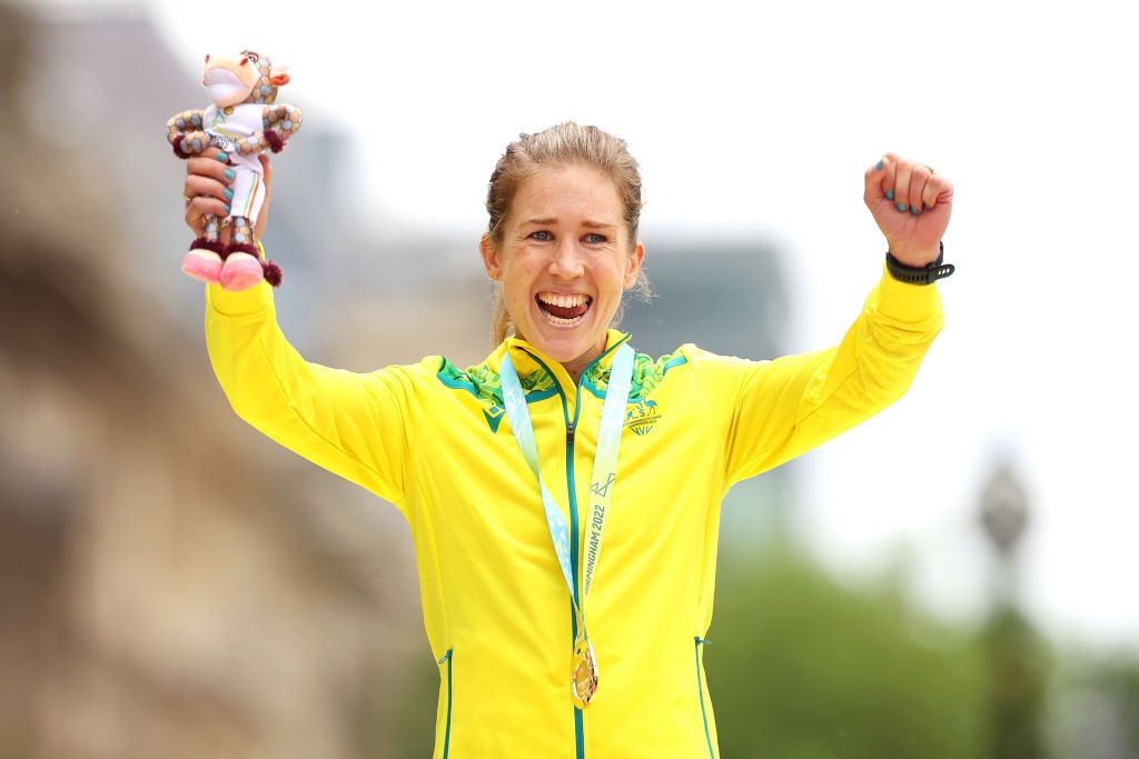 Jess Stenson smiles and holds up her fists