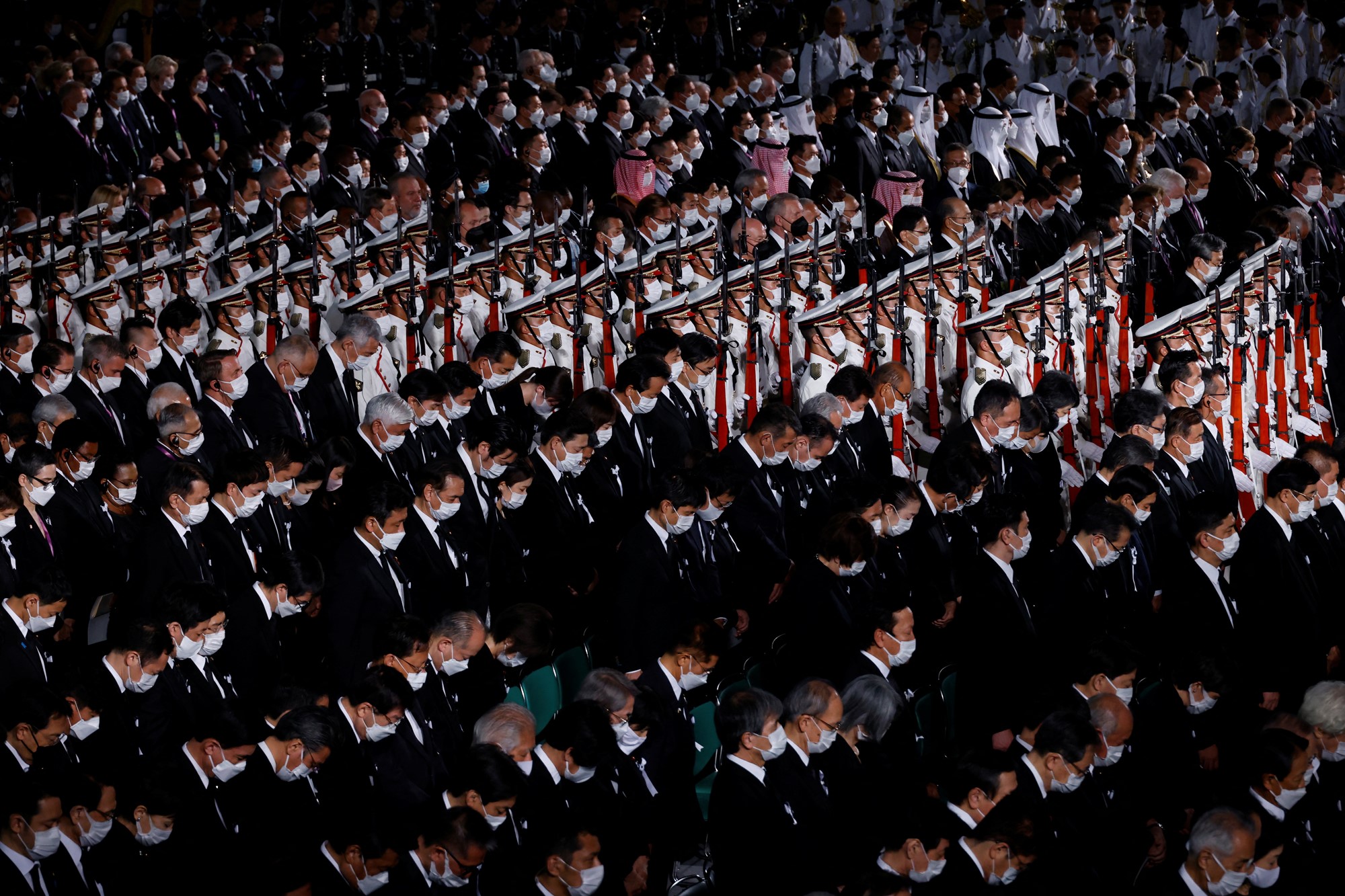 Attendees observe a moment of silence during a state funeral for former Japanese Prime Minister Shinzo Abe