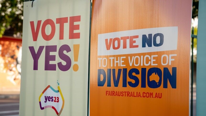 A Vote Yes and Vote No sign side by side.