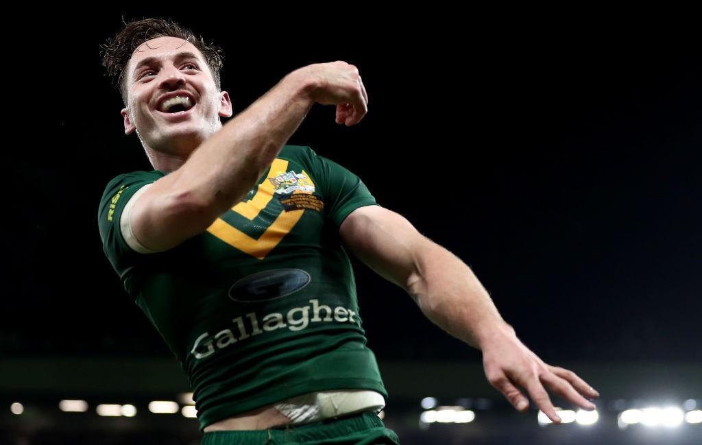 Cameron Murray throws the ball away after scoring a Rugby League World Cup try.