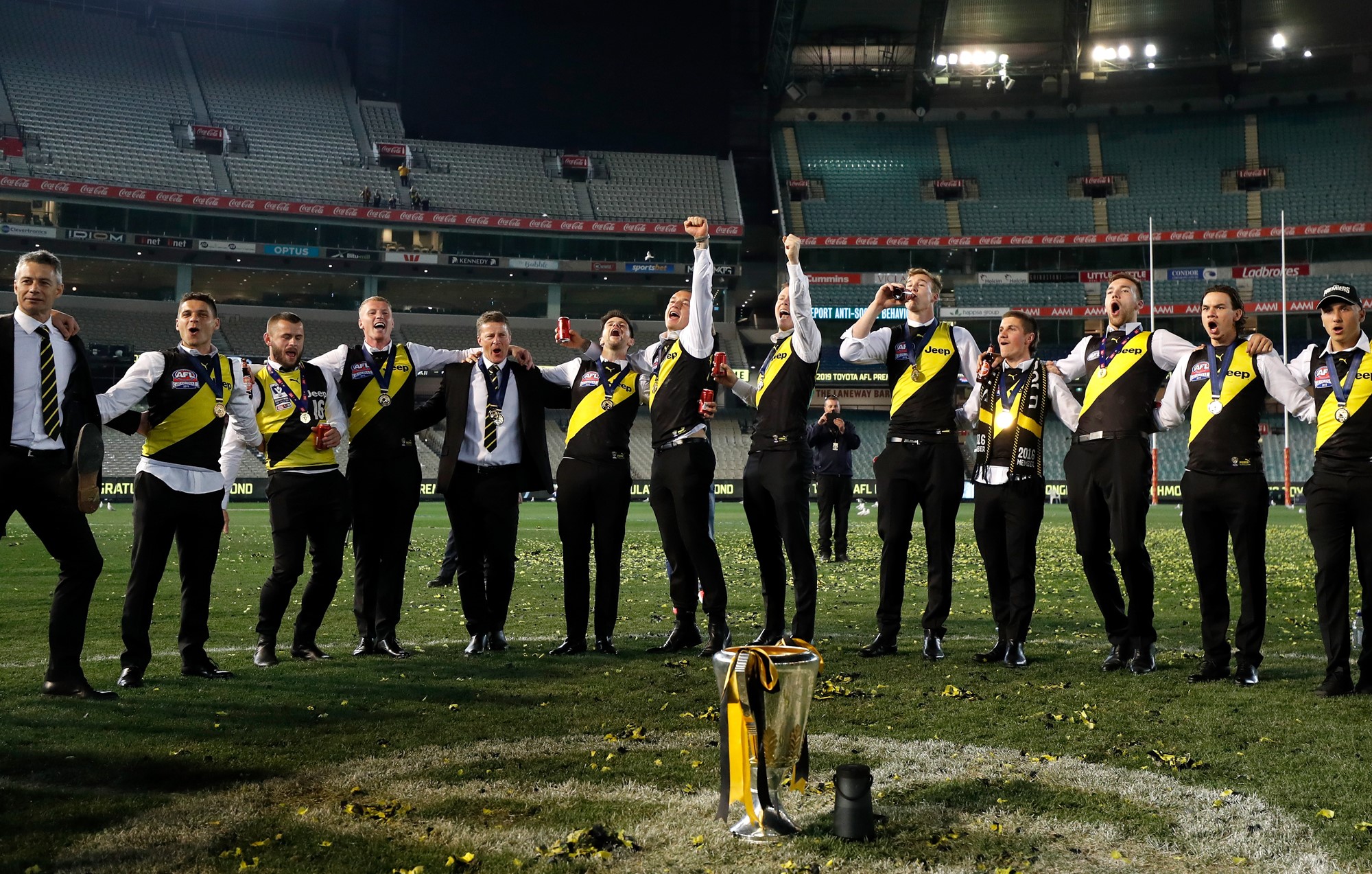 The Tigers sing the team song on the MCG after the 2019 AFL Grand Final win over GWS match between the Richmond Tigers and the GWS Giants 