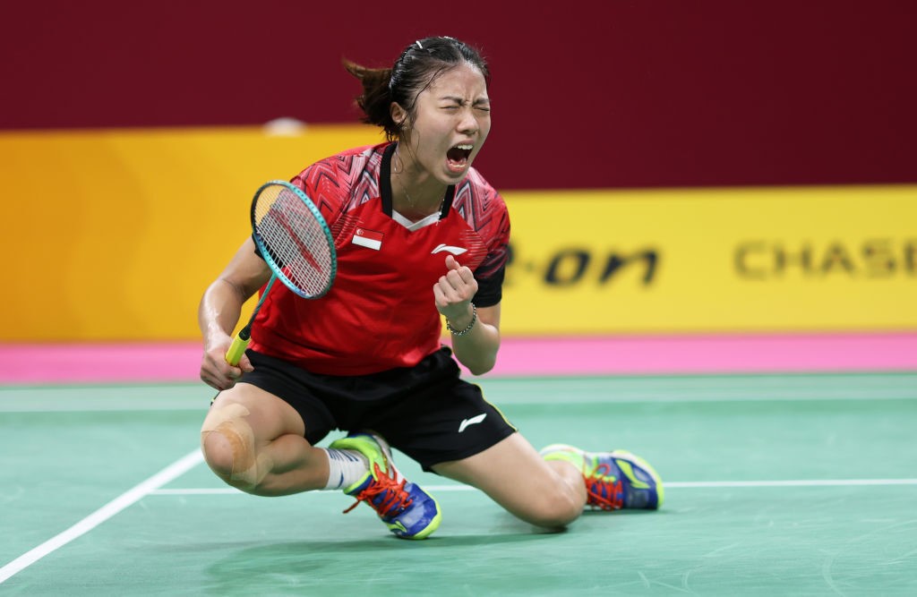 Jia Min Yeo of Team Singapore celebrates on the badminton court