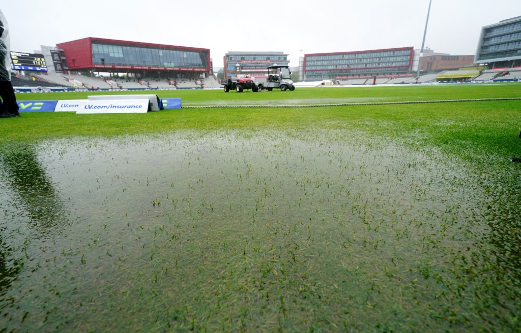 Rain on the outfield at Old Trafford during an Ashes Test.