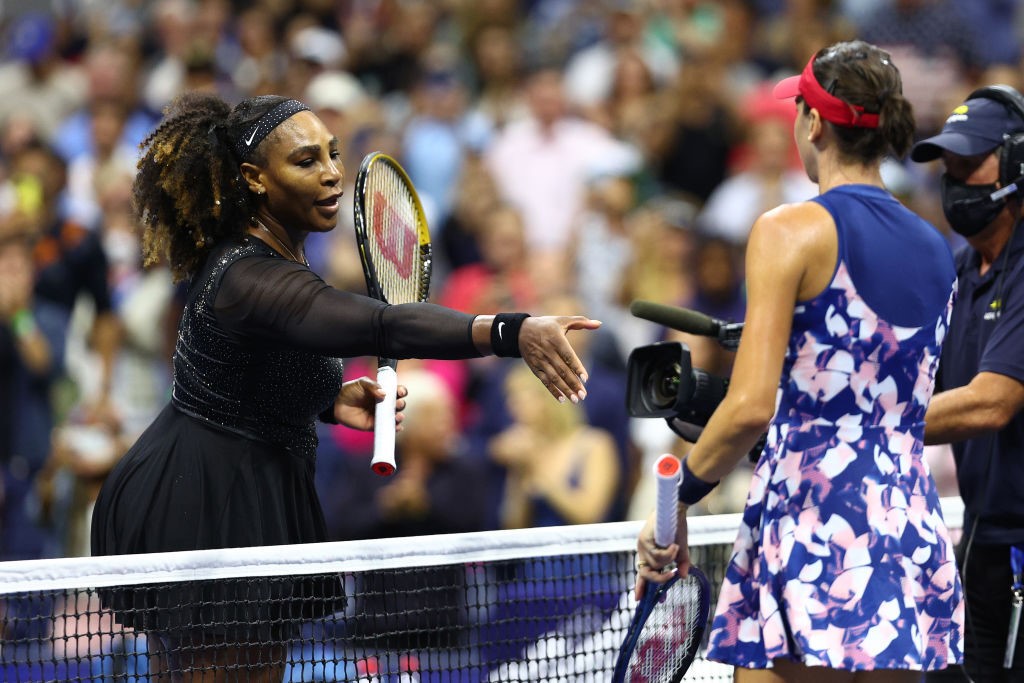 Serena Williams reaches out to shake the hand of Ajla Tomljanovic after their US Open match.