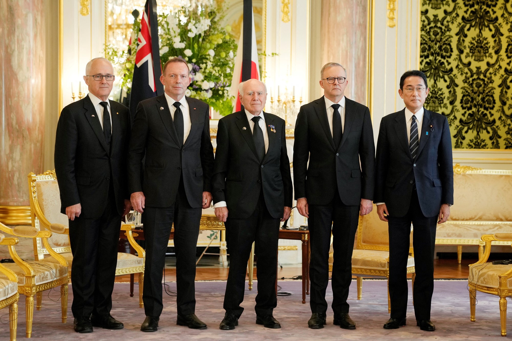  Malcolm Turnbull, from left, Tony Abbott, John Howard and current Prime Minister Anthony Albanese pose for a photo with Japanese Prime Minister Fumio Kishida