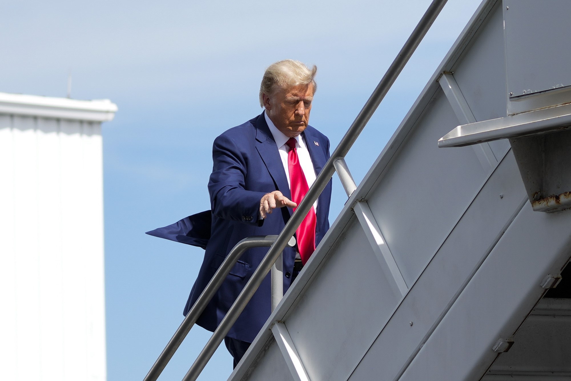 Donald Trump boards his personal plane.