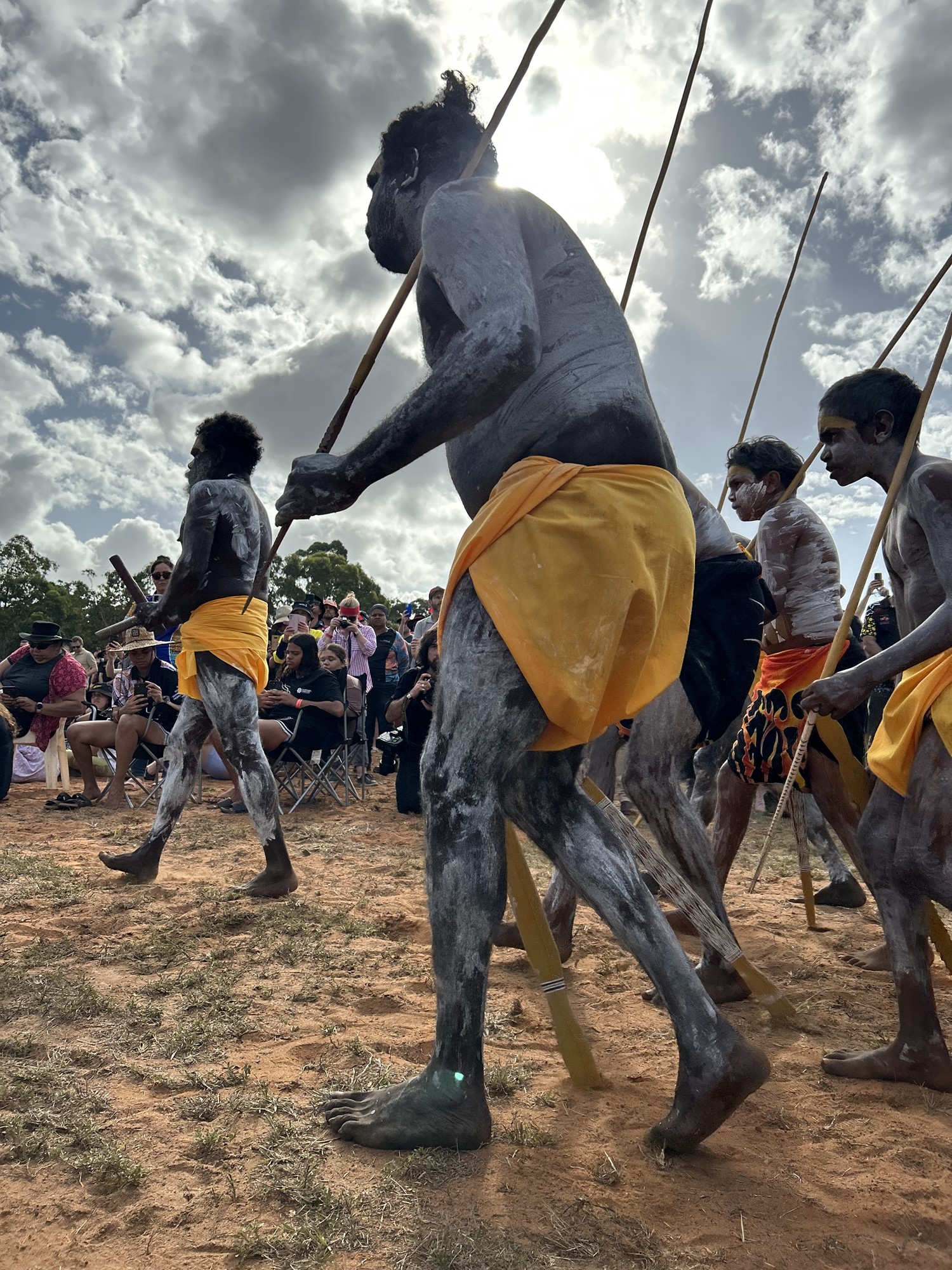 Indigenous dancers wearing body paint