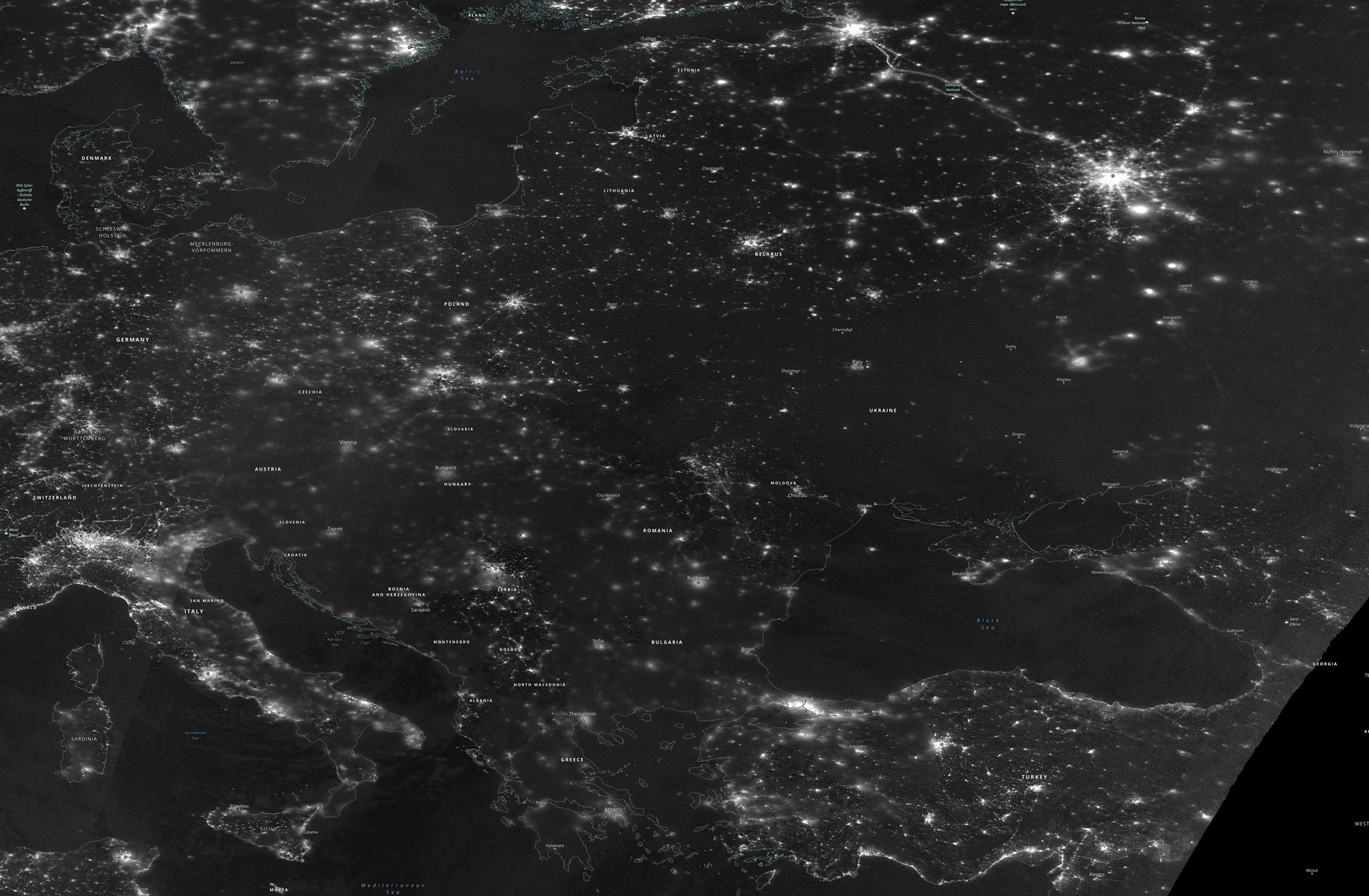 A greyscale satellite image indicating the night radiance of Europe from space on November 23, 2022,