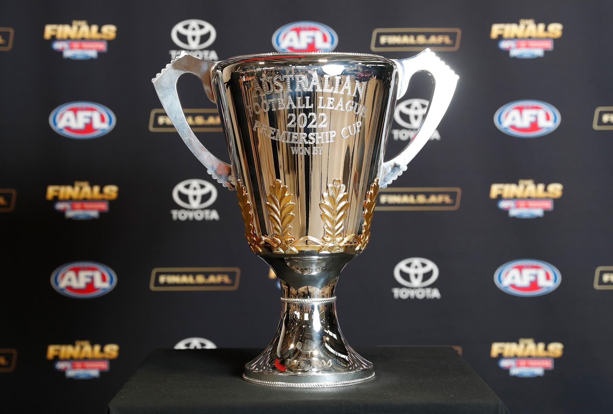 The 2022 AFL premiership cup sits on a podium