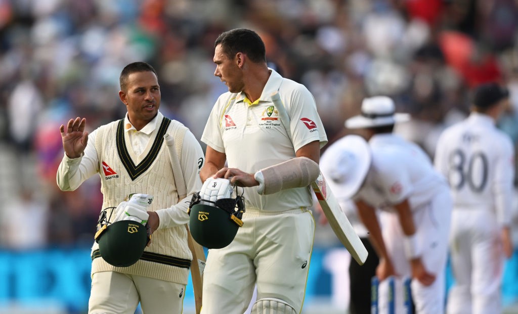 Usman Khawaja speaks to Scott Boland after day four of the first Ashes Test.