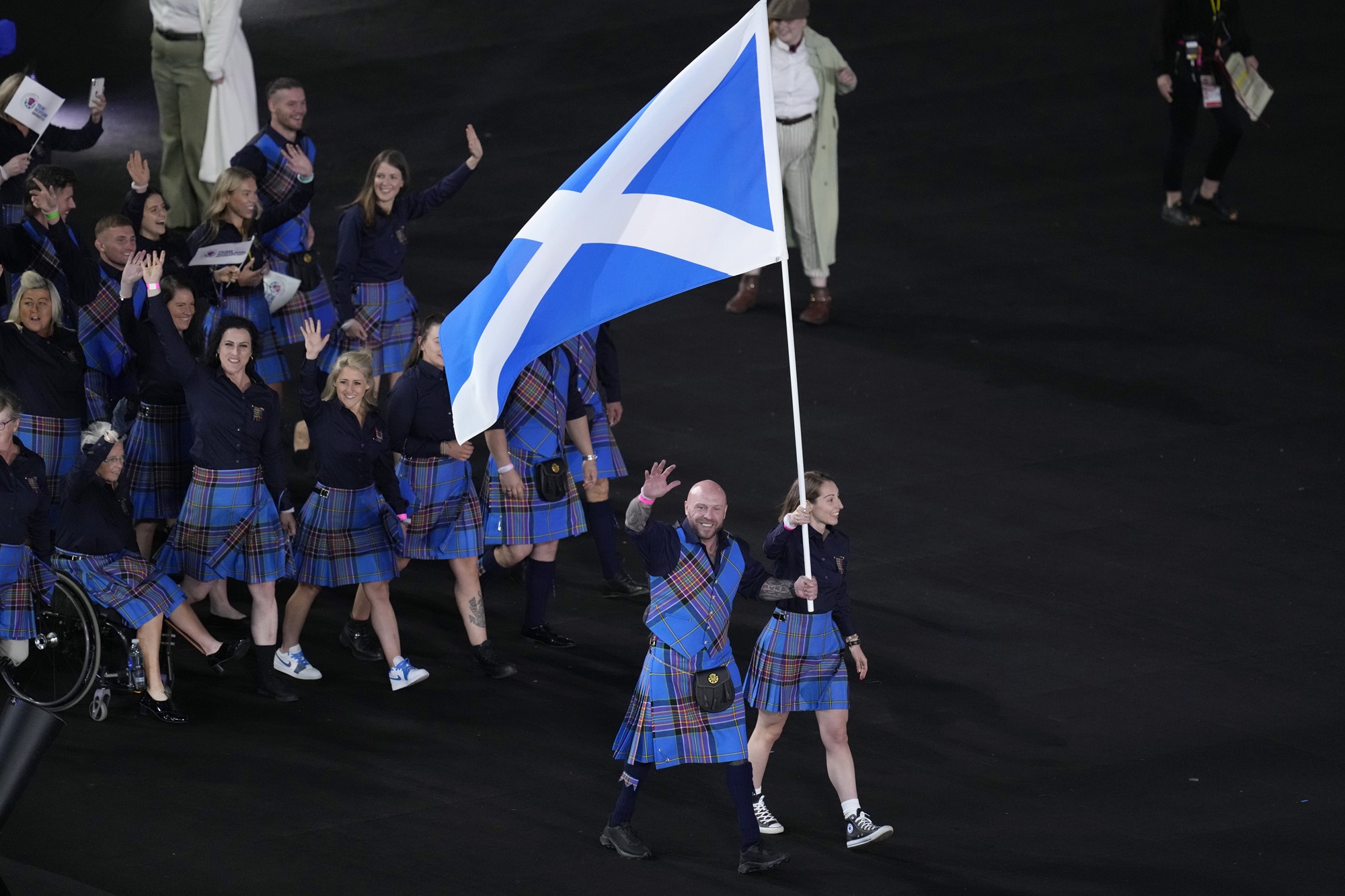 People match behind the Scotland flag