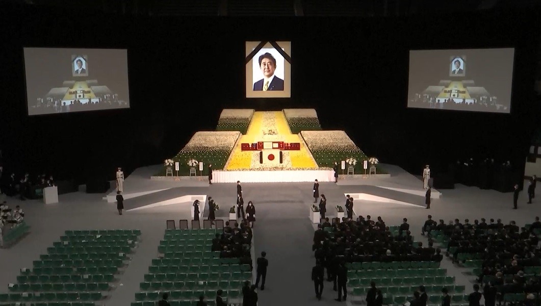 People leave the state funeral for Shinzo Abe.