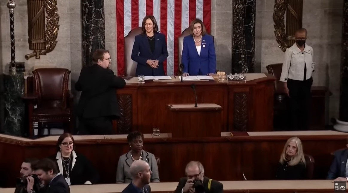 People take their seats inside US Congress.