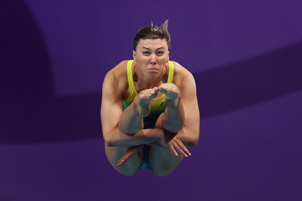 Brittany O'Brien dives in the tuck position at the Commonwealth Games.