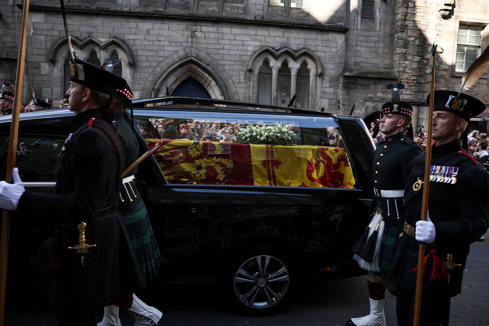 The hearse carrying the coffin of Britain's Queen Elizabeth travels on the Royal Mile in Edinburgh